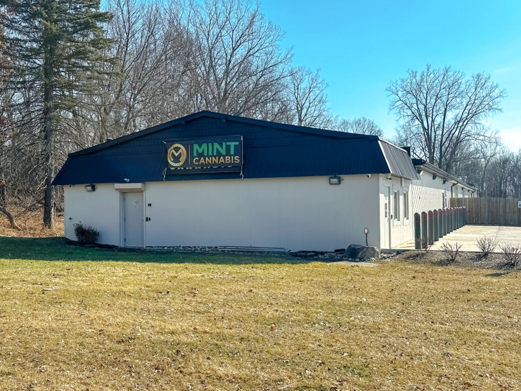 Mint Cannabis dispensary storefront in Oxford, Michigan, showcasing a variety of cannabis products